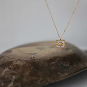 Square bee pendant necklace with white mother of pearl in 18K gold-plated titanium steel