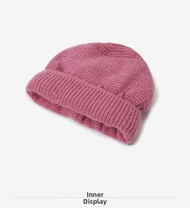 Detailed interior view showing soft fleece lining of the thick knit winter hat for women