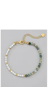 Detail view of S925 silver beaded bracelet with moss agate and white beads