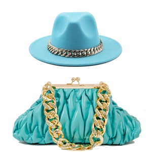 Light blue wide brim wool fedora and matching pleated cloud bag with chunky gold chains