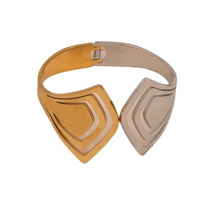 Two-tone geometric shield-shaped stainless steel cuff bracelet in gold and silver finish