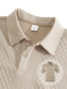 Close-up of khaki polo shirt waffle texture, ribbed collar, and precise button stitching
