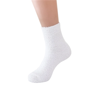 Men's fluffy coral fleece slipper socks in solid white color for cozy home lounging