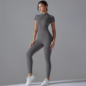 Detail of dark grey short sleeve unitard with front zipper and high stretch athletic fabric