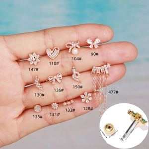 Piercings de tragus de acero inoxidable oro rosa con circón verde en diseños de serpiente y mariposa
