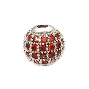 Macro shot of silver sphere bead with micro-pave set red rhinestones for DIY jewelry