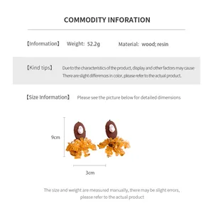Size chart for oval resin drop earrings detailing dimensions 9cm by 3cm and wood material