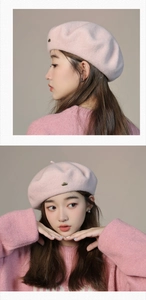Side and front view of a pink wool beret hat worn by a model in a soft studio setting
