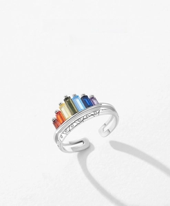 Detail of S925 silver rainbow crown ring with colorful cubic zirconia and floral engravings