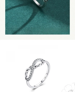 Detailed view of S925 sterling silver infinity ring with sparkling pavé zircon stones