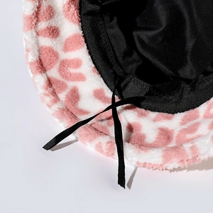 Cozy pink leopard print faux fur bucket hat with warm plush texture and interior lining