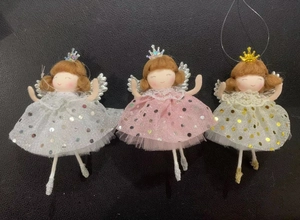 Detailed view of handmade Christmas angel pendants in white, pink and champagne sparkling colors