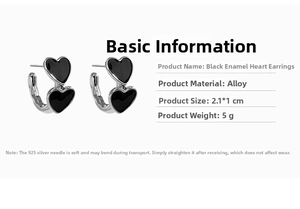 Detail view of black enamel heart earrings with size 2.1x1cm and 925 silver needle info
