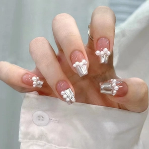 Short ballet press-on nails with white pearls, rhinestones, and silver French tips