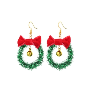 Detail of Christmas wreath earrings with red velvet bows and small gold bells