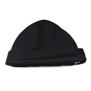 Detail of black beanie showing breathable mesh outer and smooth satin silk inner lining
