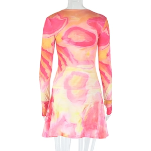 Detail of back view showing pink and orange abstract marble print on two-piece set