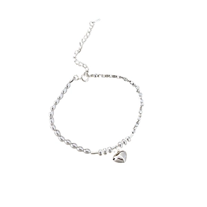 Minimalist silver beaded bracelet with heart pendant and adjustable extension chain