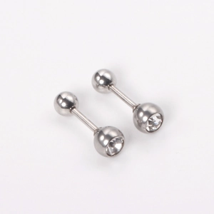 Macro detail of stainless steel stud earrings featuring a polished ball and clear zircon