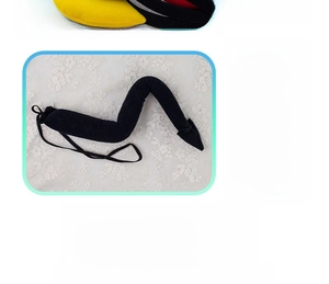 Detail of plush devil tail accessory with flexible wire for adjustable styling