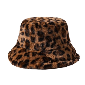 Plush leopard print faux fur bucket hat for women with soft warm texture on white background
