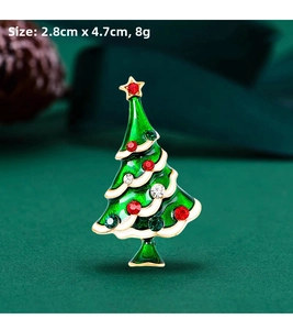 Detail shot of 2.8cm by 4.7cm enamel Christmas tree brooch with colorful rhinestones