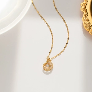 Titanium steel swan necklace with sparkling zircon pendant on a minimalist white background