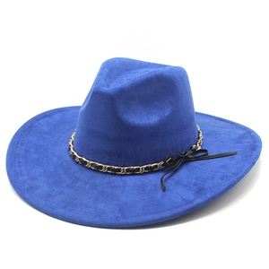 Detail of royal blue fedora hat with gold chain accent and black ribbon bow detail