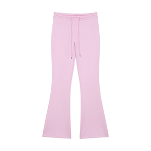 Detail of pink flare trousers with elastic drawstring waistband and soft fabric texture