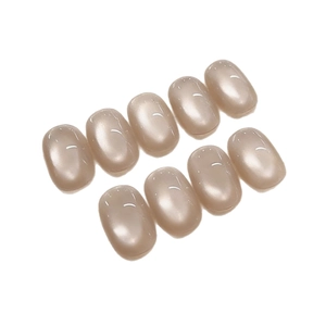 Short oval press-on nails in soft pink ice-permeable glass bead cat eye pearl finish