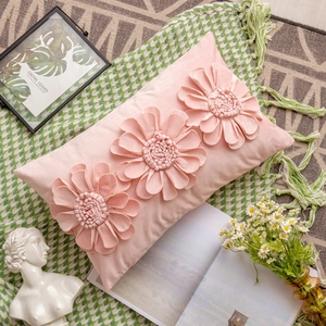 Pink floral pillow cover featuring three 3D handmade flowers on soft velvet fabric