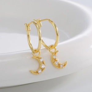 Luxurious gold-plated hollow moon earrings with sparkling zircon stones and hoop clasp
