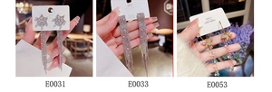 Close-up of geometric tassel earrings with S925 silver needles and rhinestone pearls