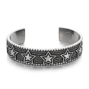 Retro stainless steel open cuff bracelet with embossed stars and oxidized silver finish