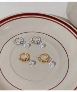 Detailed close-up of S925 silver hoop earrings with teardrop zircon charms in gold and silver