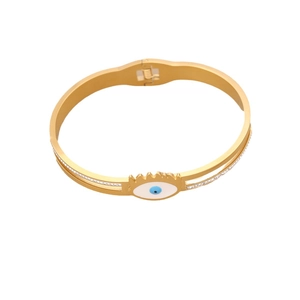 Golden stainless steel evil eye open cuff bracelet with white rhinestones on white background
