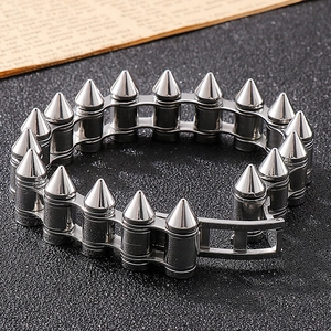 Close-up of silver punk bullet-style stainless steel motorcycle chain bracelet for men