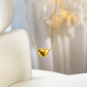 Elegant 18K gold-plated titanium steel necklace with a 3D heart pendant and OT buckle