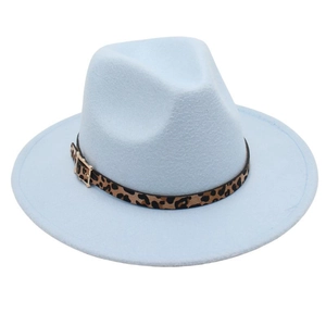 Detail of light blue fedora hat featuring leopard print band and golden square buckle