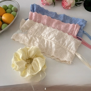 Detailed embroidery lace scrunchies featuring adjustable drawstring design in pastel colors