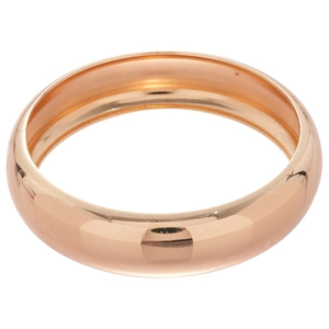 Bracelet jonc géométrique poli en or rose avec une surface lisse et courbée élégante