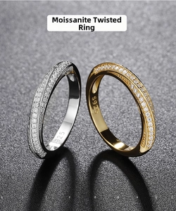 Detailed view of Mobius wrap ring with S925 hallmark and sparkling moissanite stones