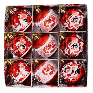Set of 9 red Christmas balls with hand-painted Santa and reindeer in a gift box