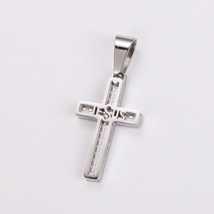 Polished stainless steel cross pendant with cutout JESUS lettering and silver finish