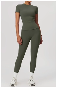 Detail view of deep olive green quick-dry yoga set with slim fit top and high waist leggings