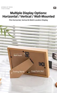 Detail of wooden frame back showing folding stand and hooks for wall or desk display