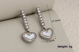 Detailed view of heart-shaped pearl shell earrings with zircons measuring 27.3mm, weight 5g