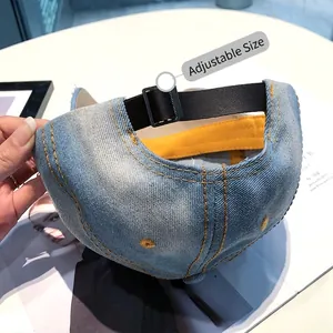 Adjustable light blue denim baseball cap with yellow stitching and metal slide buckle