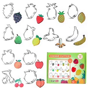 12-piece stainless steel cookie cutter set with various fruit shapes and FDA packaging