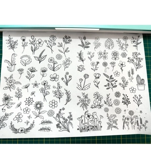 Bohemian floral water-soluble embroidery stabilizers with DIY plant patterns on green mat